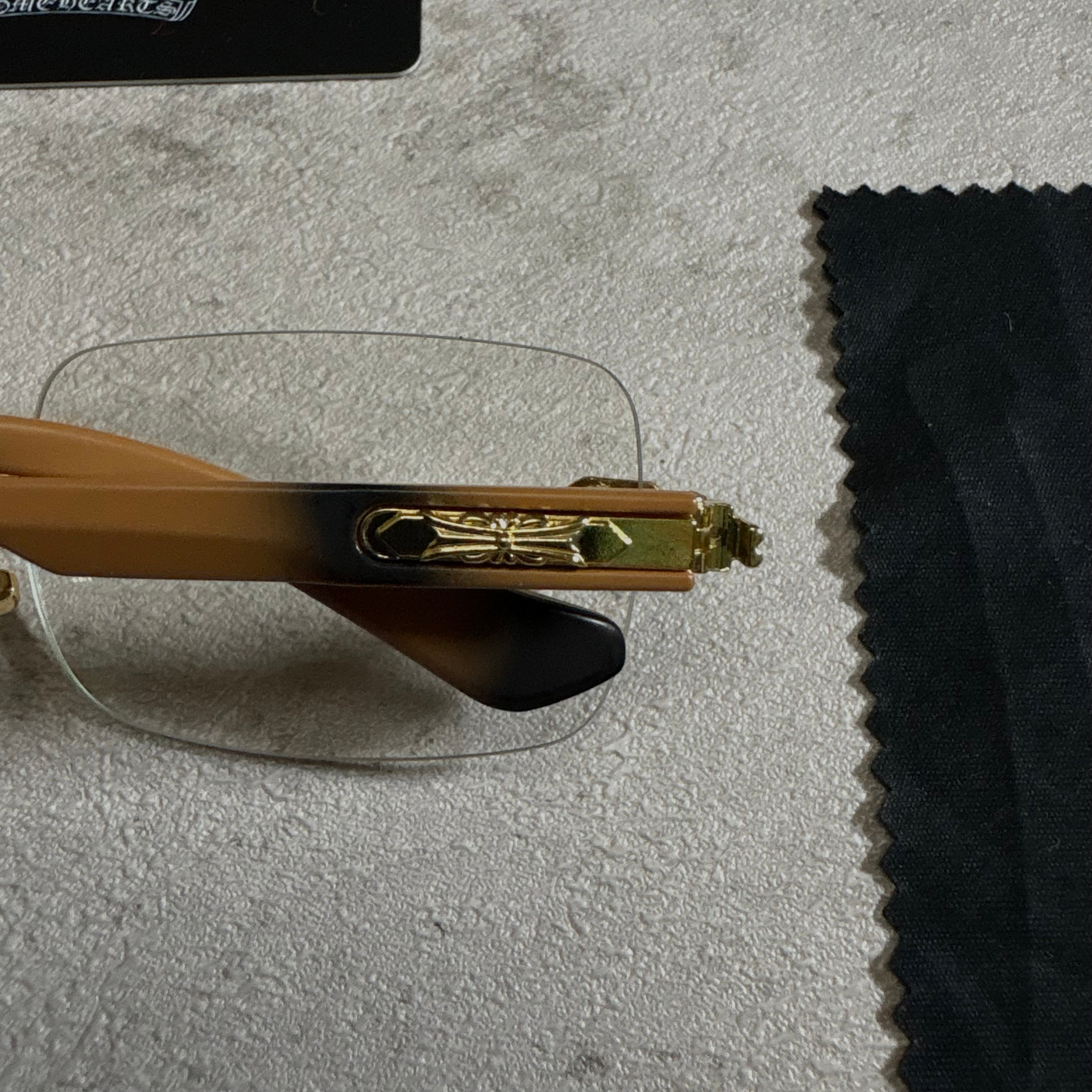 Chrome Hearts Deep II rimless glasses brown and gold