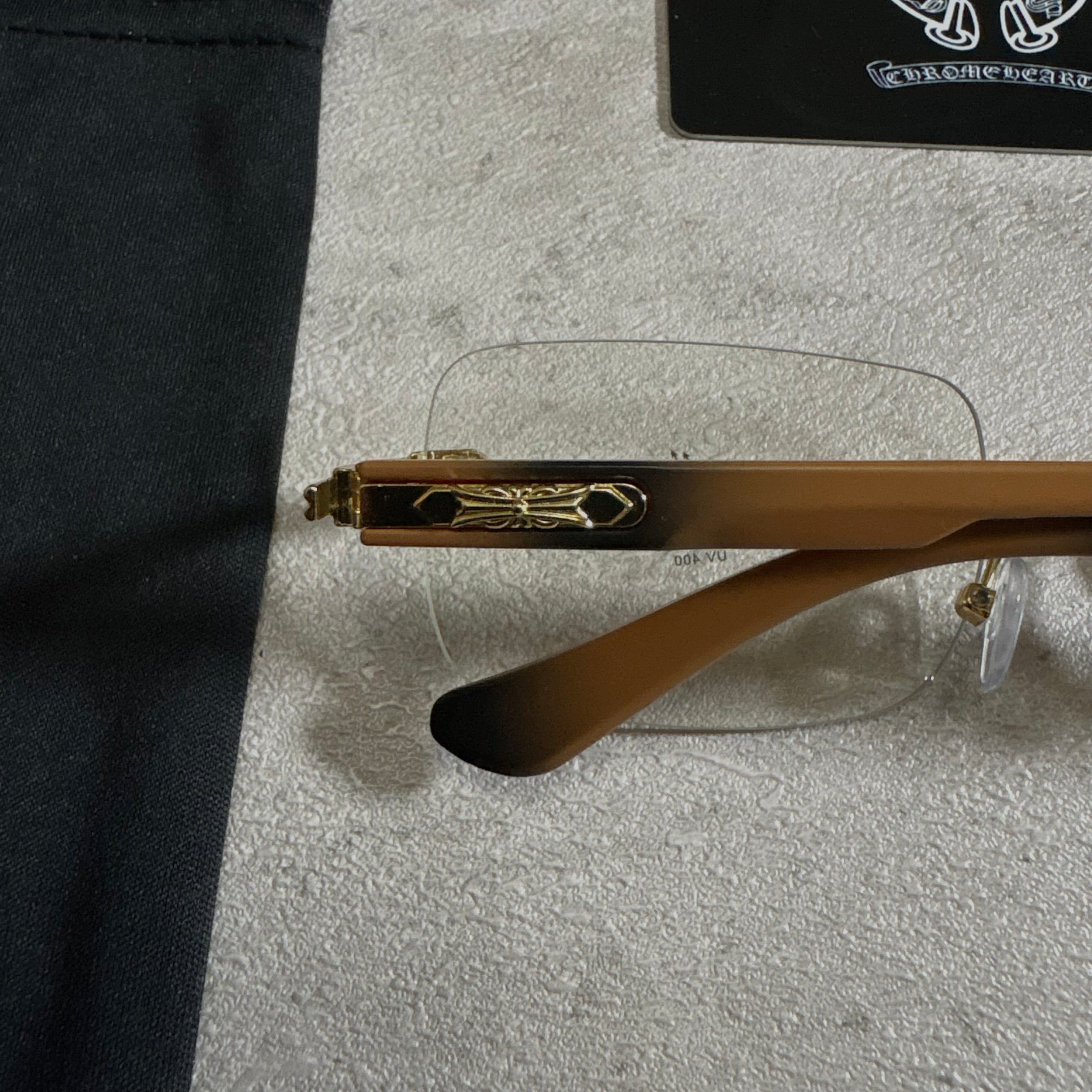 Chrome Hearts Deep II rimless glasses brown and gold
