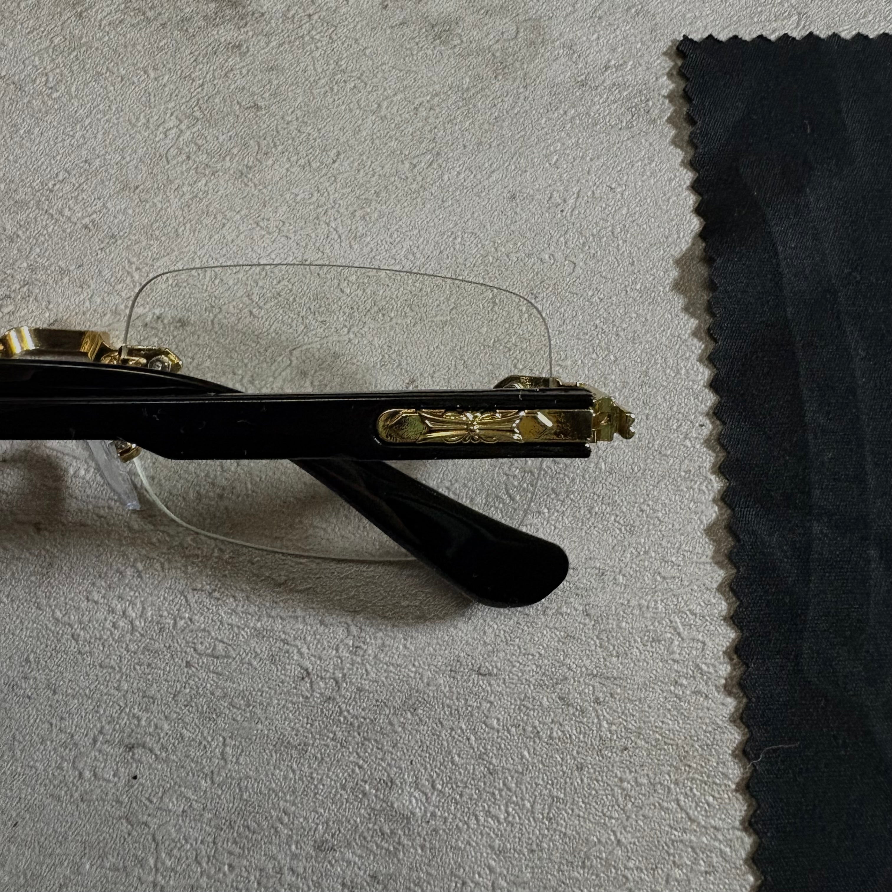 Chrome Hearts Deep II rimless Glasses black and gold