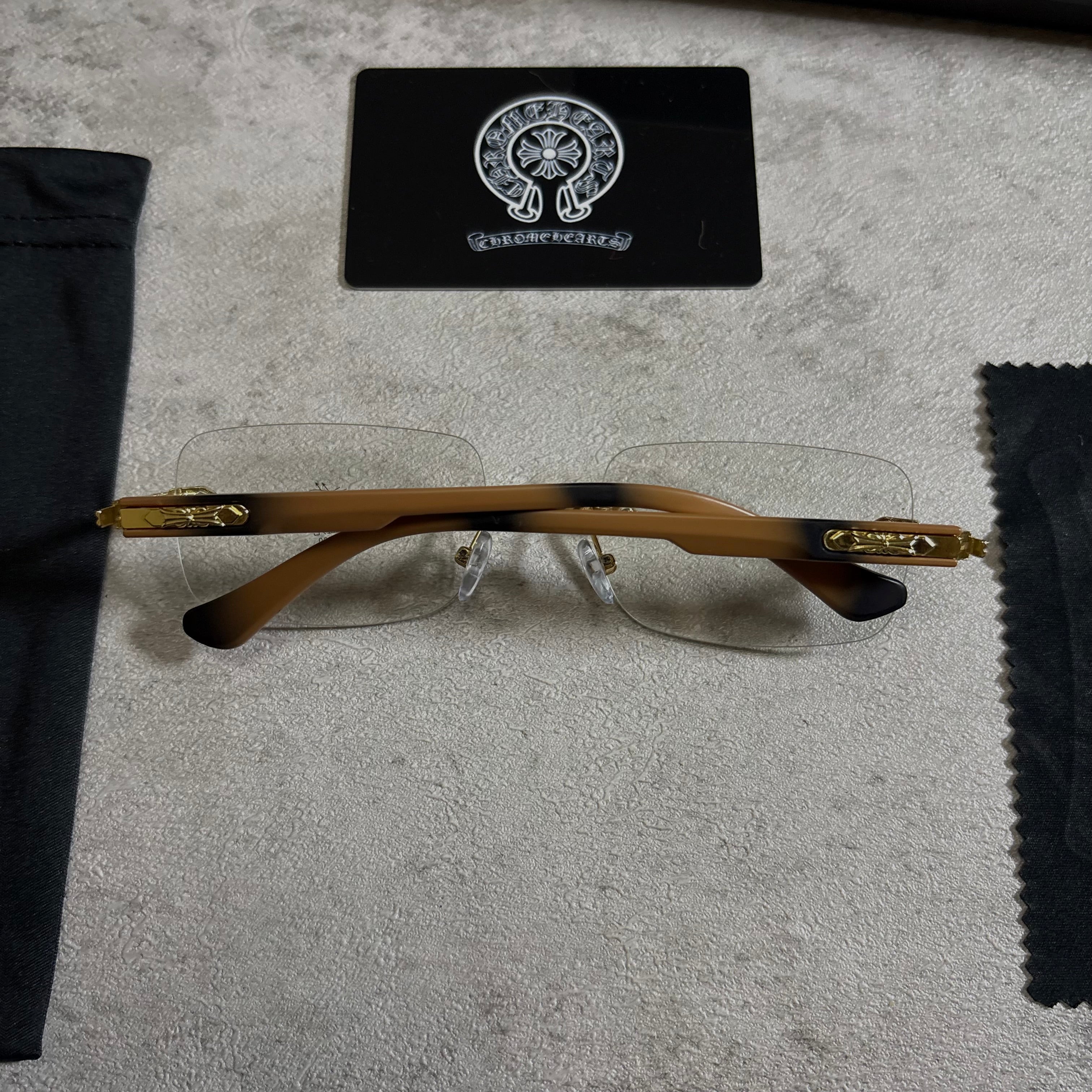 Chrome Hearts Deep II rimless glasses brown and gold
