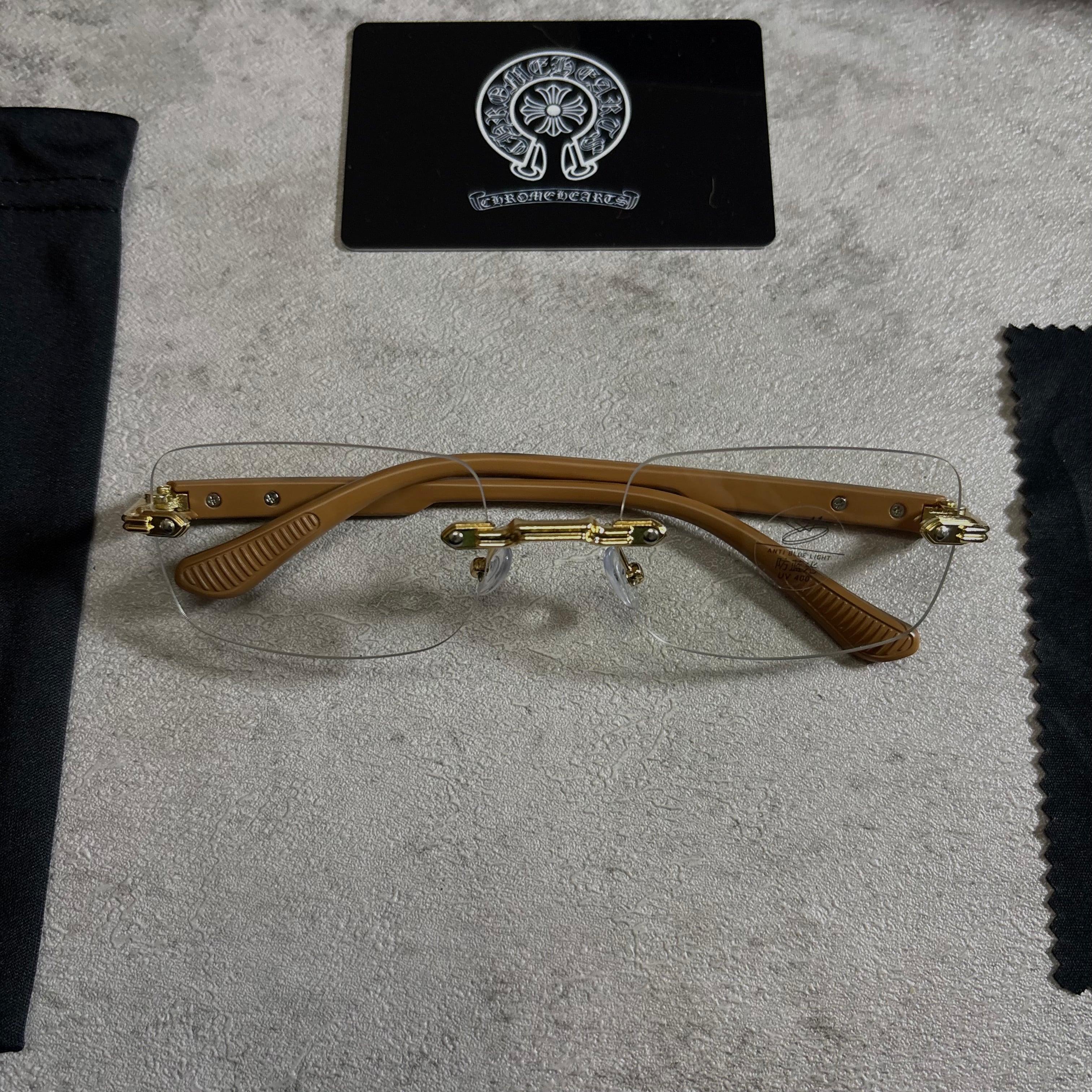 Chrome Hearts Deep II rimless glasses brown and gold
