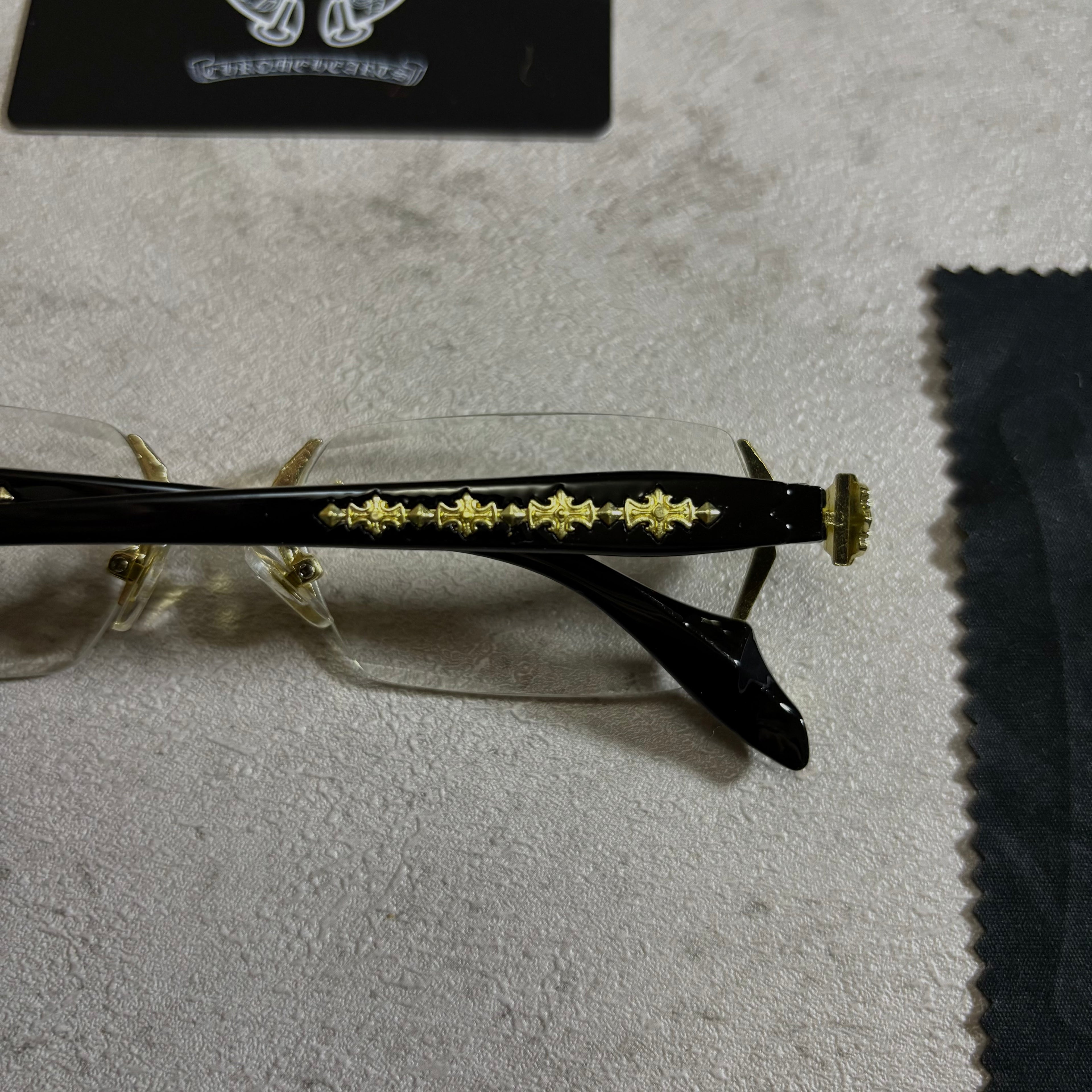 Chrome Hearts rimless Glasses black and gold
